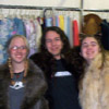 A fuzzy picture of Rae, Roy and Erin, in bad fur coats.